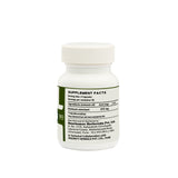 A bottle of Tulasi Capsules, a natural dietary supplement made from Tulsi