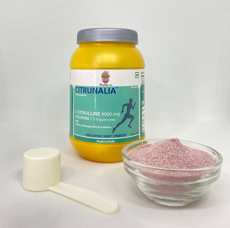 Yellow jar of Citrunalia Nutraceutical Powder with white and green label and scoop on top, surrounded by ingredients including pomegranate and cinnamon.